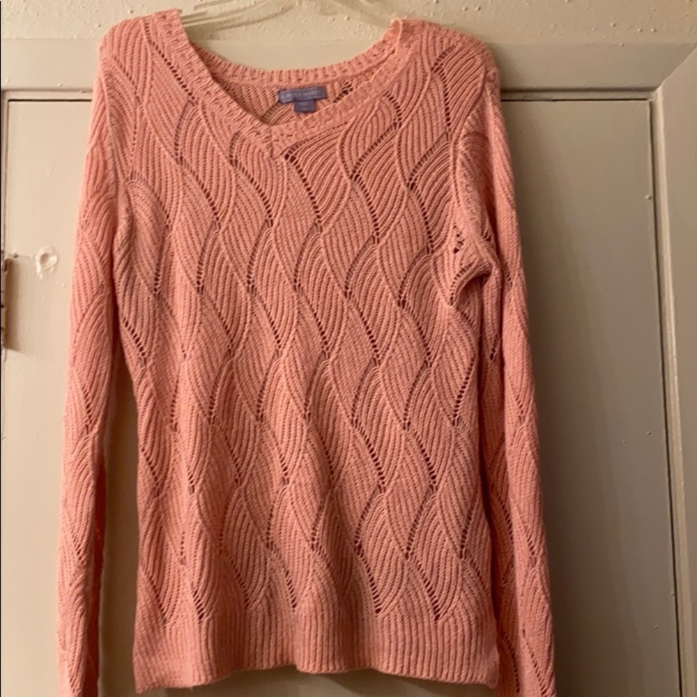 A pink sweater